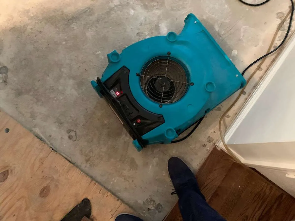 Air mover drying subfloor during Leak Detection & Repair in San Bernardino